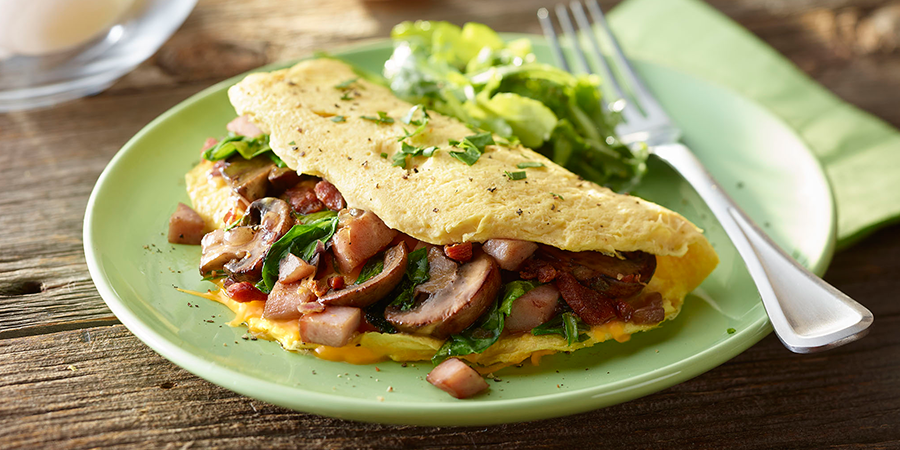 Bacon, Ham, Spinach and Cheese Omelette